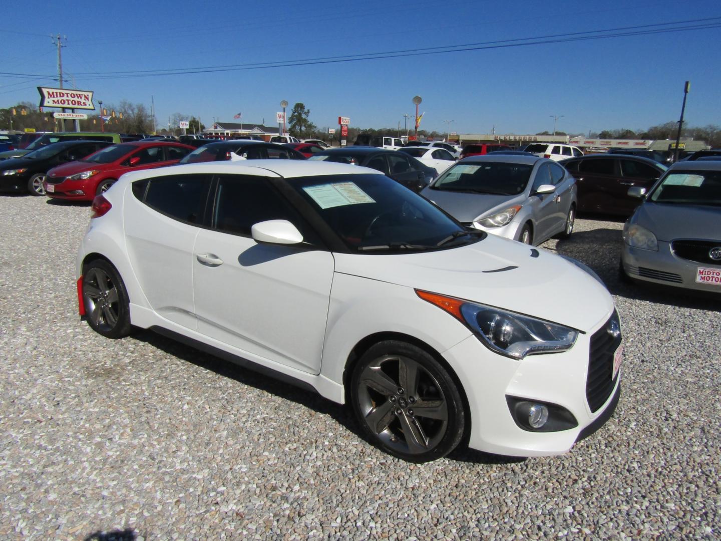 2014 White /Red Hyundai Veloster (KMHTC6AE3EU) with an 4 CYL engine, 6-Speed Manual transmission, located at 15016 S Hwy 231, Midland City, AL, 36350, (334) 983-3001, 31.306210, -85.495277 - Photo#0